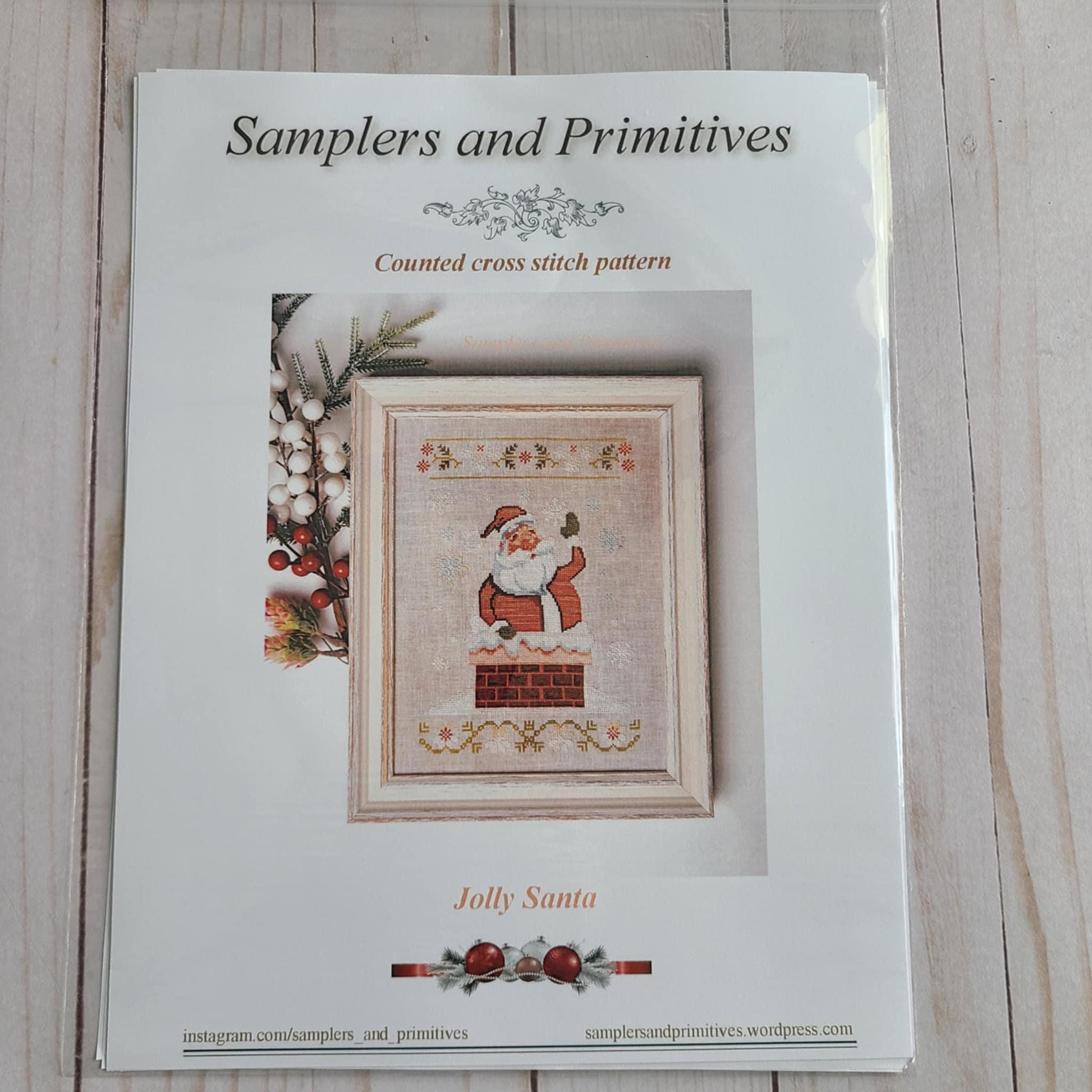 Jolly Santa by Samplers and Primitives Cross Stitch Pattern